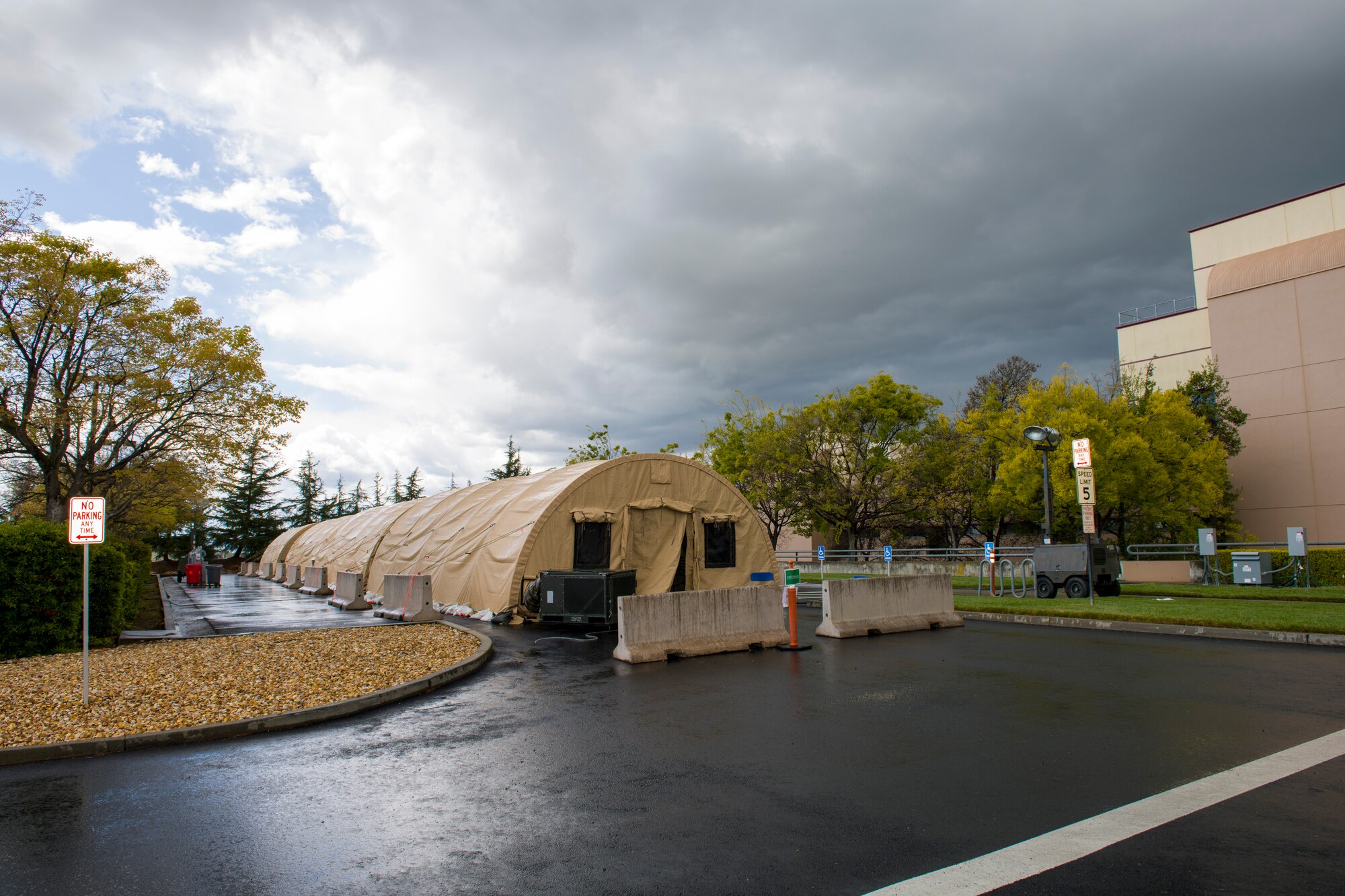 A COVID-19 testing site awaits patients March 25, 2020, at Travis Air Force Base, California. The testing location, which is located outside the emergency room of David Grant USAF Medical Center, is one of two sites the base is providing to support COVID-19 testing.  (U.S. Air Force photo by Tech. Sgt. James Hodgman)