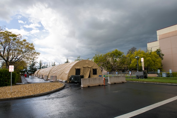 A COVID-19 testing site awaits patients March 25, 2020, at Travis Air Force Base, California. The testing location, which is located outside the emergency room of David Grant USAF Medical Center, is one of two sites the base is providing to support COVID-19 testing.  (U.S. Air Force photo by Tech. Sgt. James Hodgman)