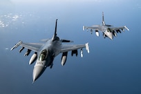 Two U.S. Air Force F-16 Fighting Falcons fly over Afghanistan, March 17, 2020. The F-16 Fighting Falcon is a compact, multi-role fighter aircraft that delivers war- winning airpower to the U.S. Central Command area of responsibility. (U.S. Air Force photo by Tech. Sgt. Matthew Lotz)
