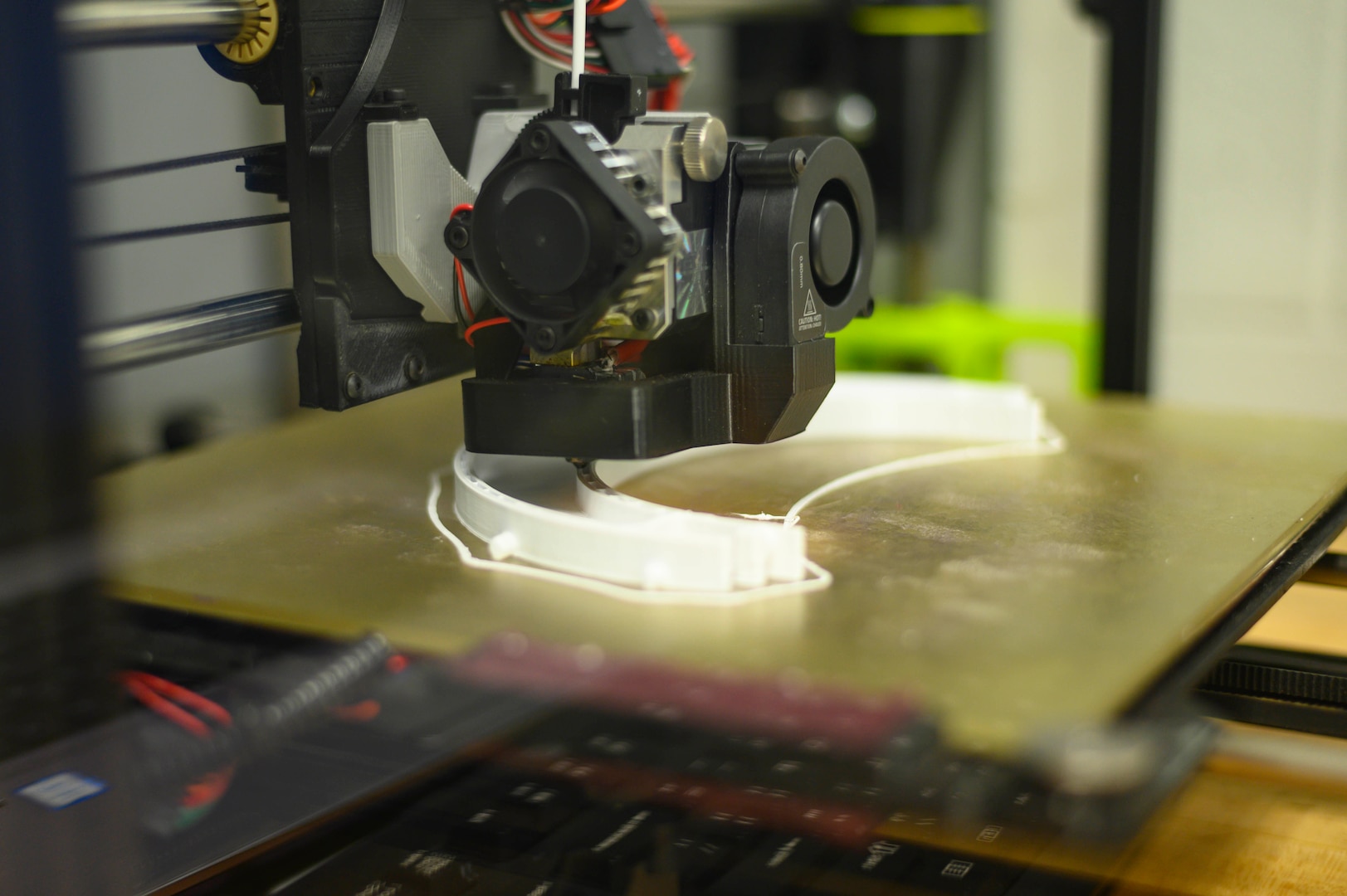 A 130th Airlift Wing LulzBot TAZ 6 Dual Platinum 3D printer prints a face-shield prototype March 27, 2020, at McLaughlin Air National Guard Base, Charleston, W.Va. The 130th Airlift Wing used the printer to develop a prototype face shield for production to fulfill a statewide shortage caused by the COVID-19 outbreak.