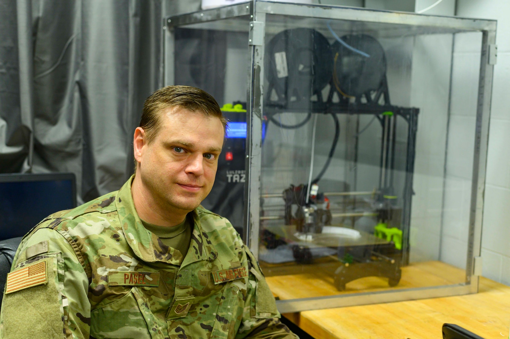 Tech. Sgt. Alan Pasel, an aircraft metals technology specialist assigned to the 130th Maintenance Squadron, with a LulzBot TAZ 6 Dual Platinum 3D printer at McLaughlin Air National Guard Base, Charleston, W.Va., March 27, 2020. Pasel used the printer to design a face shield prototype for production to fulfill a statewide shortage caused by the COVID-19 outbreak.