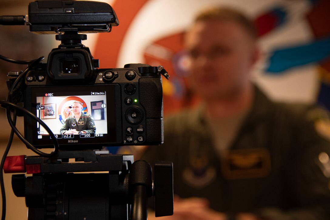 Photo of Airman framed up in a camera.