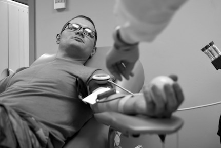 Military member giving blood