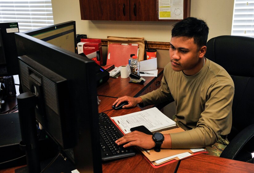 Senior Airman Jebren Medina, a 628th Logistics Readiness Squadron vehicle mechanic, works in his office at Joint Base Charleston, S.C., March 30, 2020.