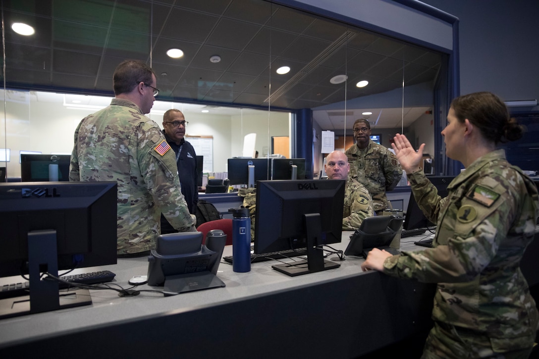 A team of the Delaware National Guard Airmen and Soldiers in partnership with the U.S. Army Corps of Engineers Philadelphia District, work with the Delaware Emergency Management Agency to provide support to the COVID-19 pandemic planning efforts, at the DEMA headquarters, Smyrna, Del., March 27, 2020. (U.S. Army National Guard (Photo by Sgt. Laura Michael.)