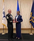Master Sgt. Cary Ann Thomas, 628th Contracting Squadron contingency cell section chief, receives the Spirit of the Chief Award, the Coast Guard’s equivalent to the John Levitow Award in Petaluma, California, Feb. 28, 2020.