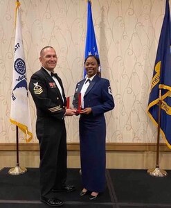 Master Sgt. Cary Ann Thomas, 628th Contracting Squadron contingency cell section chief, receives the Spirit of the Chief Award, the Coast Guard’s equivalent to the John Levitow Award in Petaluma, California, Feb. 28, 2020.