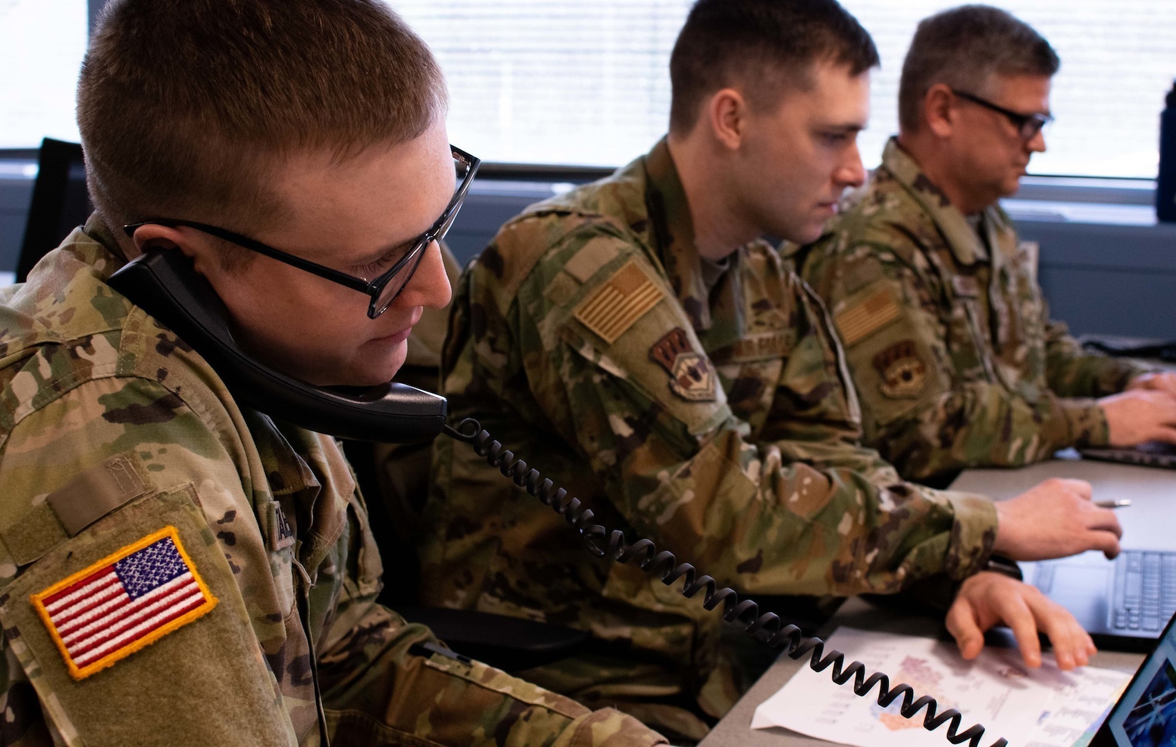 Kentucky National Guard Soldiers and Airmen augment the COVID-19 Call Center to manage data collection and case management March 31, 2020.