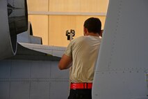 A photo of an airman working on the flight line