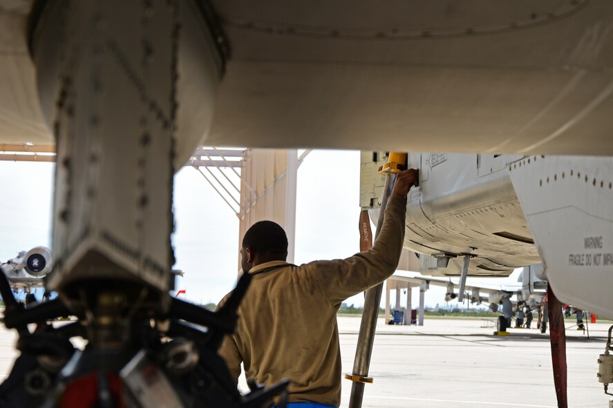 A photo of an airman working on the flight line