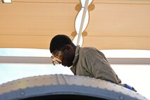 A photo of an airman working on the flight line