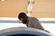 A photo of an airman working on the flight line