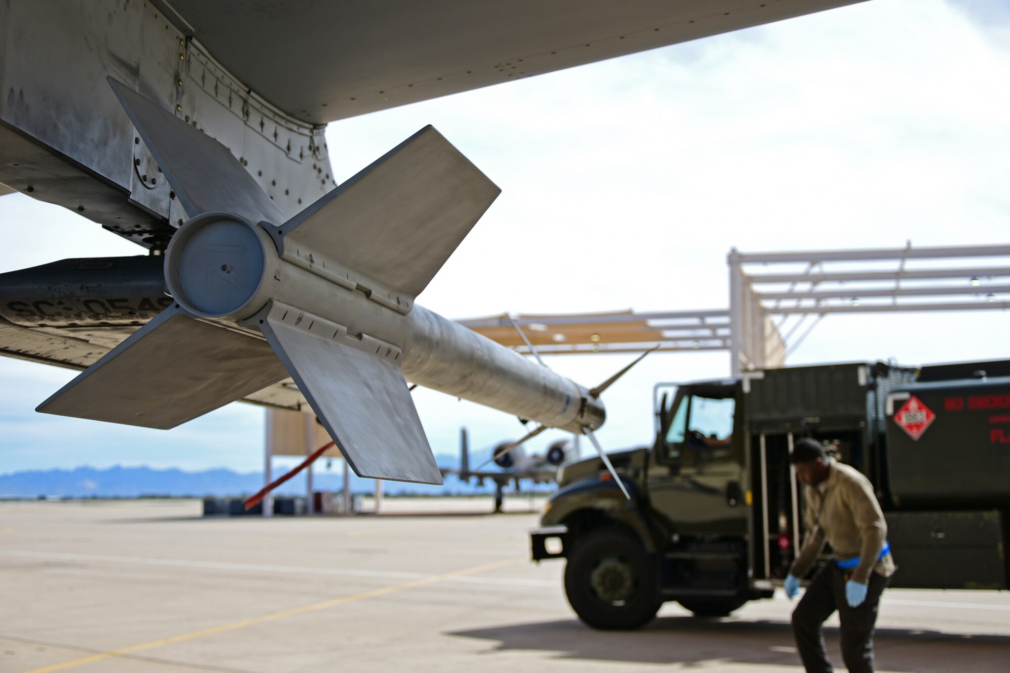 A photo of an airman working on the flight line