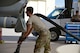 A photo of an airman working on the flight line