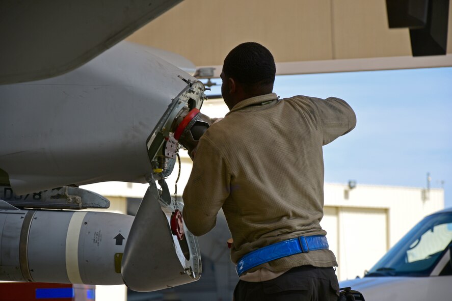 A photo of an airman working on the flight line