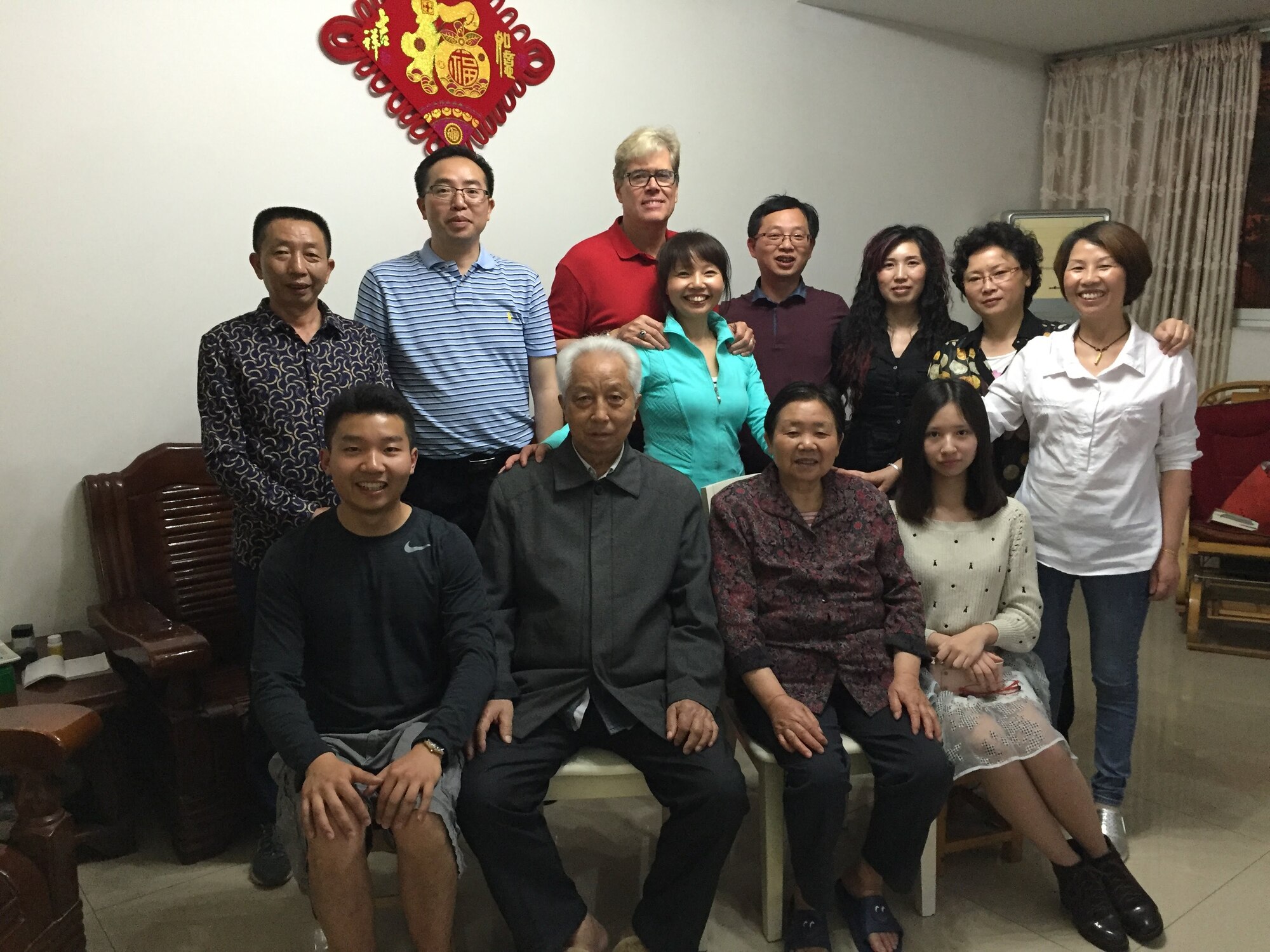 131st Bomb Wing Director of Psychological Health Dan Shea (back row, third from left) poses for a photo with his extended family members in Chongqing, China (Courtesy photo).