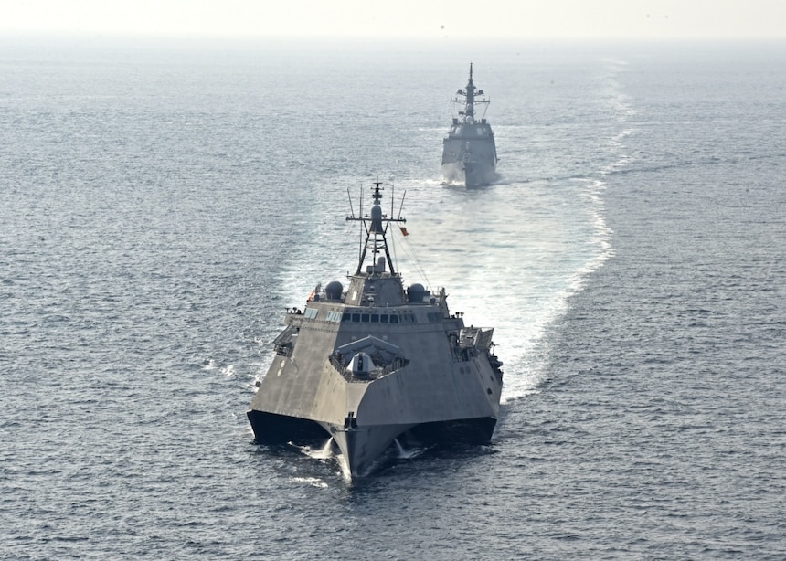 ANDAMAN SEA (April 2, 2020) The Independence-variant littoral combat ship USS Gabrielle Giffords (LCS 10), front, sails in formation with the Japan Maritime Self-Defense Force (JMSDF) Akizuki-class destroyer JS Teruzuki (DD 116) during a cooperative deployment, April 2, 2020. Gabrielle Giffords, part of Destroyer Squadron Seven, is on a rotational deployment, operating in the U.S. 7th Fleet area of operations to enhance interoperability with partners and serve as a ready-response force.