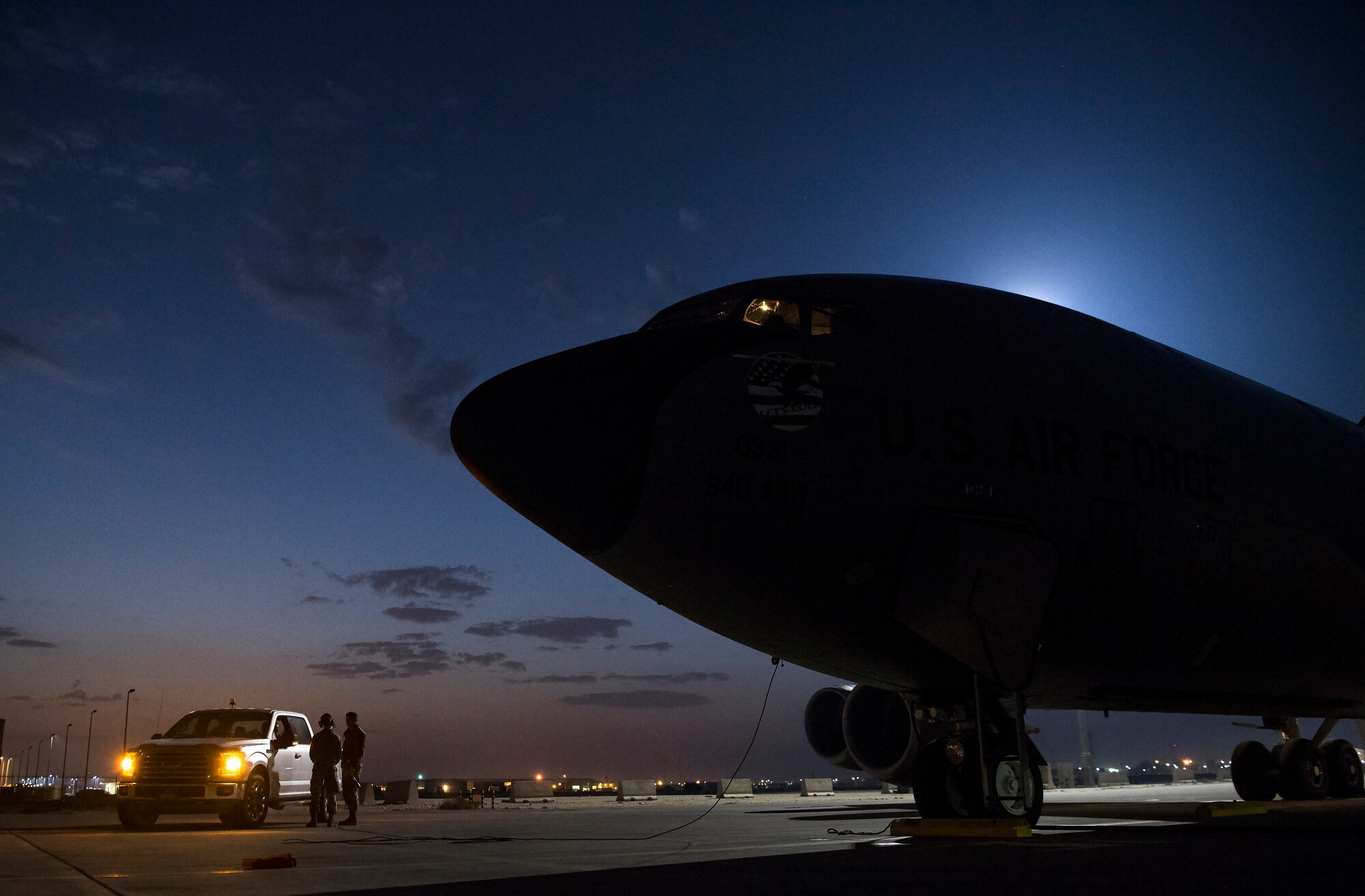 U.S. Air Force crew chiefs assigned to the 385th Expeditionary Aircraft Maintenance Squadron, conduct a preflight brief outside of a KC-135 Stratotanker at Al Udeid Air Base, Qatar, Feb. 6, 2020.