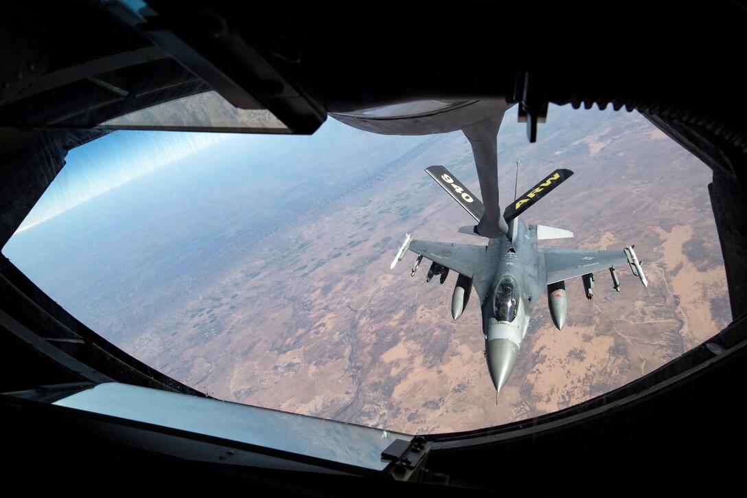 A U.S. Air Force F-16 Fighting Falcon assigned to the 555th Expeditionary Fighter Squadron, performs an aerial refueling over Iraq, Feb. 6, 2020.