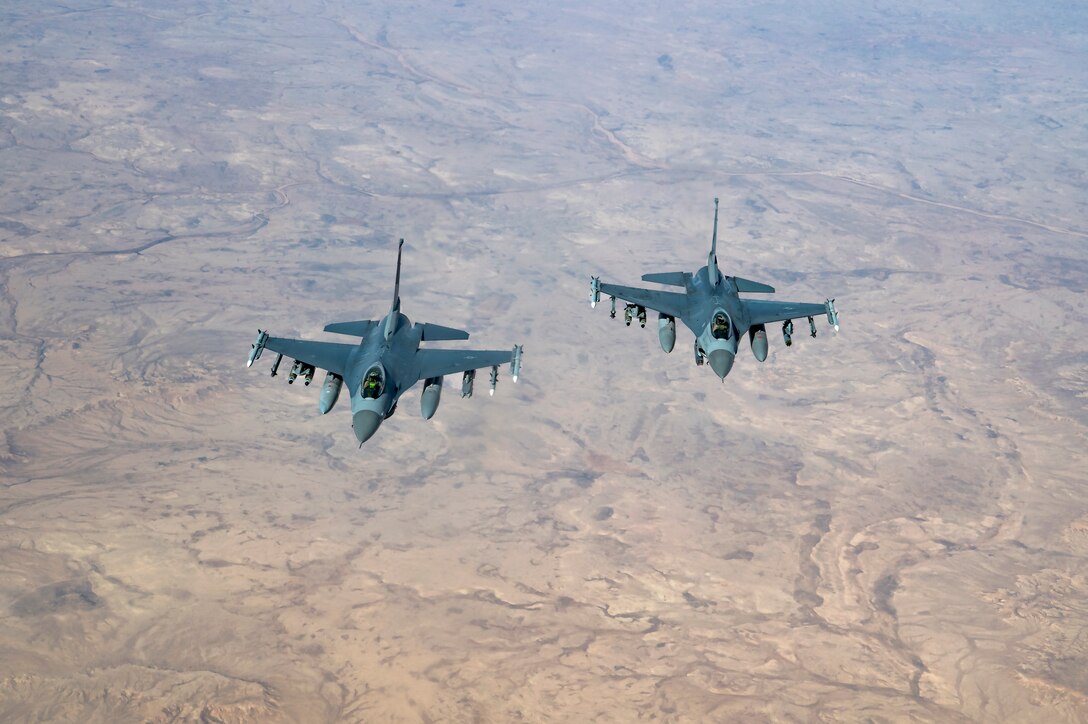 Two U.S. Air Force F-16 Fighting Falcons assigned to the 555th Expeditionary Fighter Squadron, fly over Iraq, Feb. 6, 2020.
