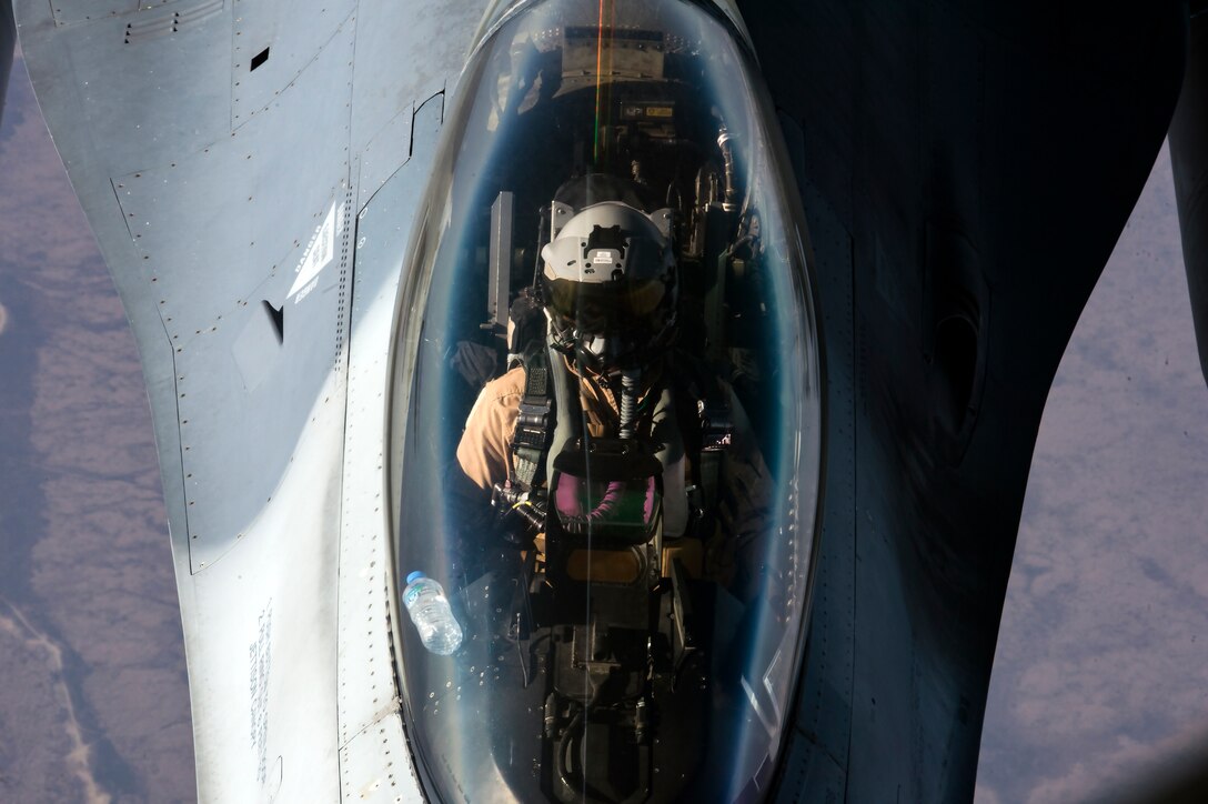 A U.S. Air Force F-16 Fighting Falcon pilot assigned to the 555th Expeditionary Fighter Squadron flies over Iraq, Feb. 6, 2020.