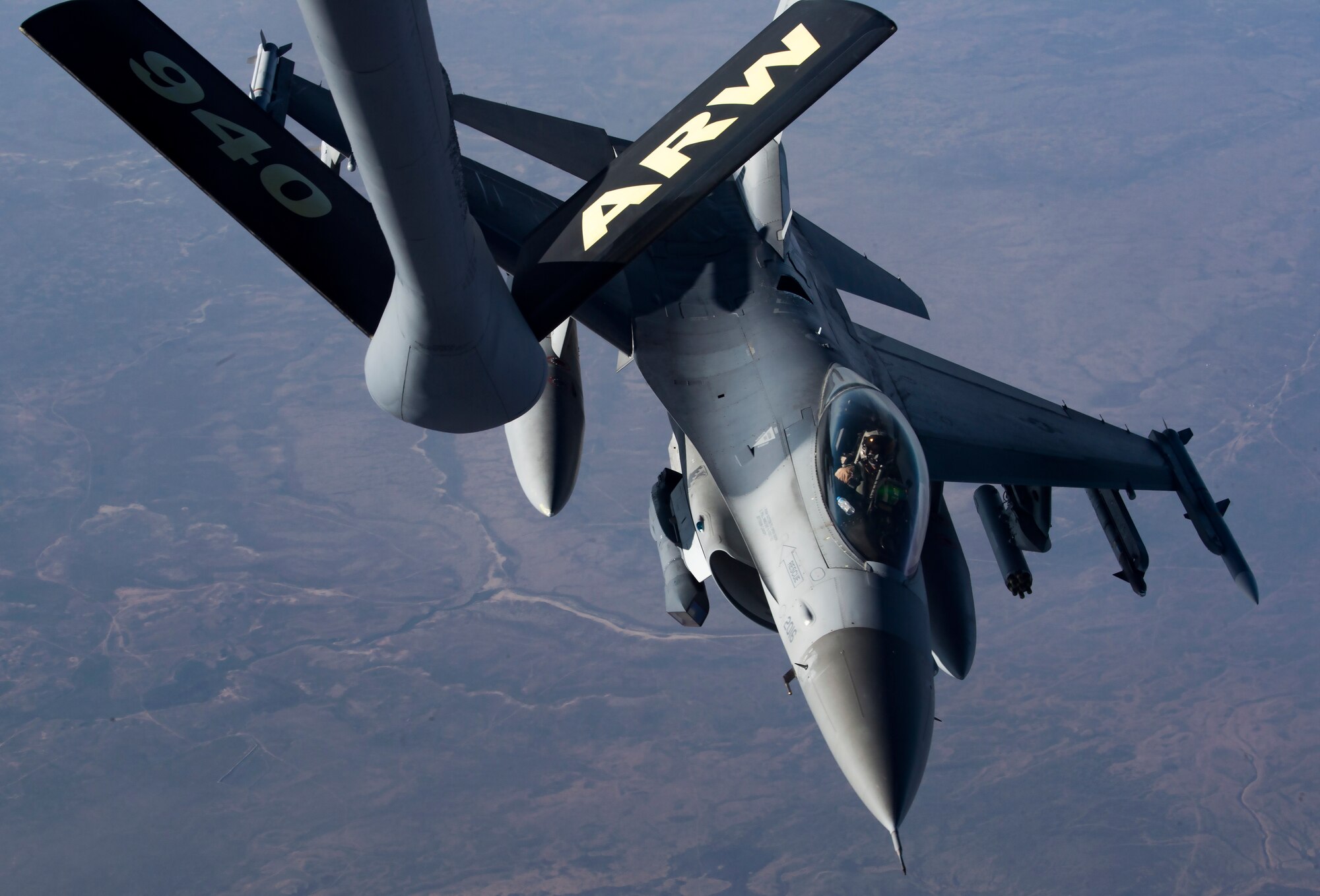 A U.S. Air Force F-16 Fighting Falcon assigned to the 555th Expeditionary Fighter Squadron finishes an aerial refueling over Iraq, Feb. 6, 2020.