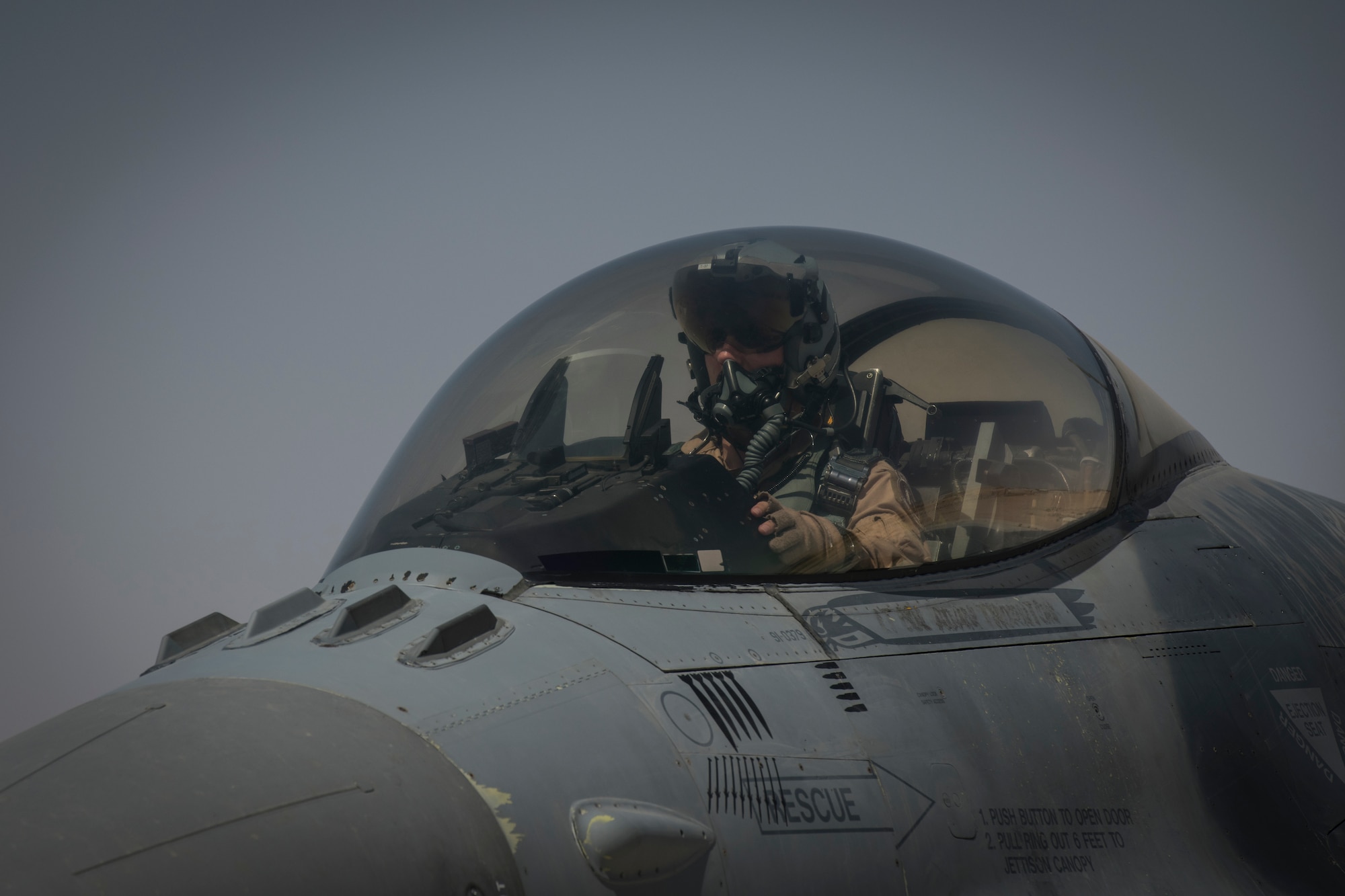 A U.S. Air Force F-16 “Viper” Fighting Falcon pilot assigned to the 79th Expeditionary Fighter Squadron lands at an undisclosed location in the U.S. Central Command area of responsibility, Feb. 14, 2020.
