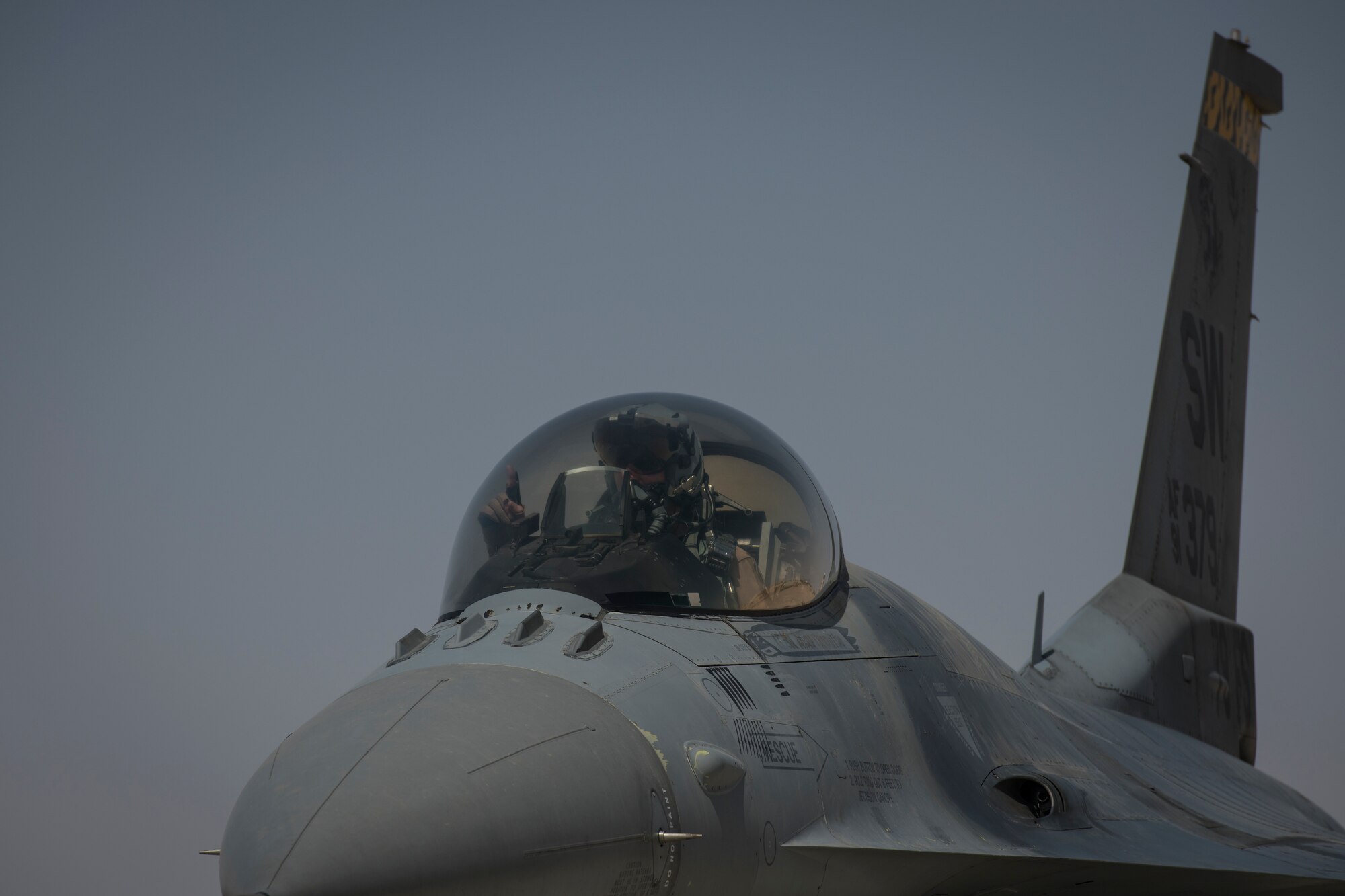 A U.S. Air Force F-16 “Viper” Fighting Falcon pilot assigned to the 79th Expeditionary Fighter Squadron lands at an undisclosed location in the U.S. Central Command area of responsibility, Feb. 14, 2020.