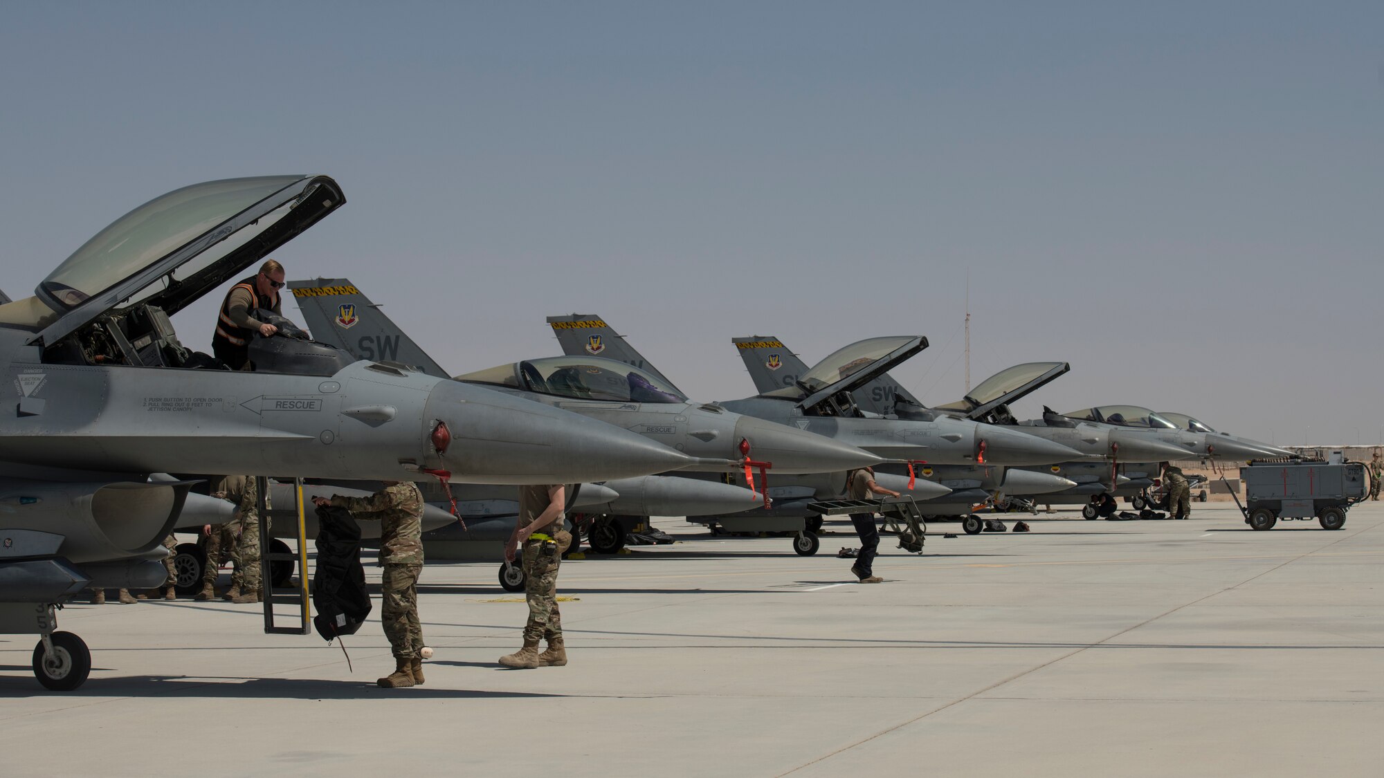 Six U.S. Air Force F-16 “Viper” Fighting Falcons assigned to the 79th Expeditionary Fighter Squadron rest on a flightline at an undisclosed location in the U.S. Central Command area of responsibility, Feb. 14, 2020.