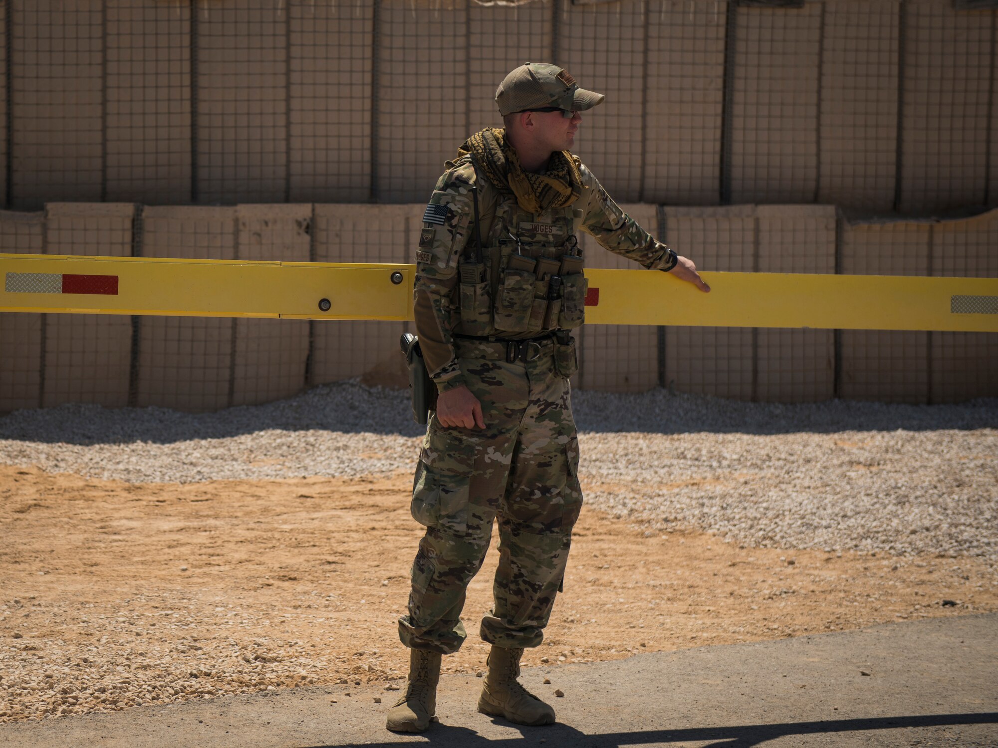 U.S. Air Force Airman Brec Voges, a security forces member with the 379th Expeditionary Security Forces Squadron, monitors an entry control point at an undisclosed location in the U.S. Central Command area of responsibility, Feb. 18, 2020.