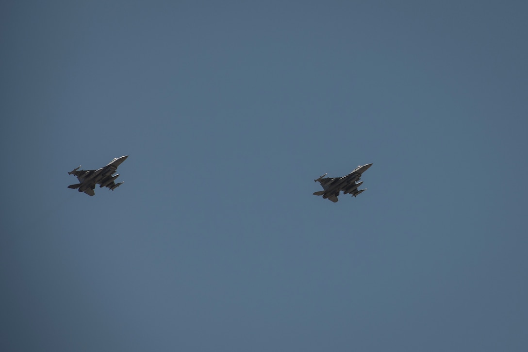 Two U.S. Air Force F-16 “Viper” Fighting Falcons assigned to the 79th Expeditionary Fighter Squadron fly above an undisclosed location in the U.S. Central Command area of responsibility, Feb. 14, 2020.