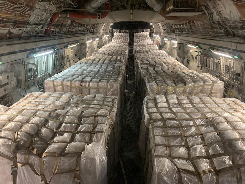 A photo of pallets on an aircraft.