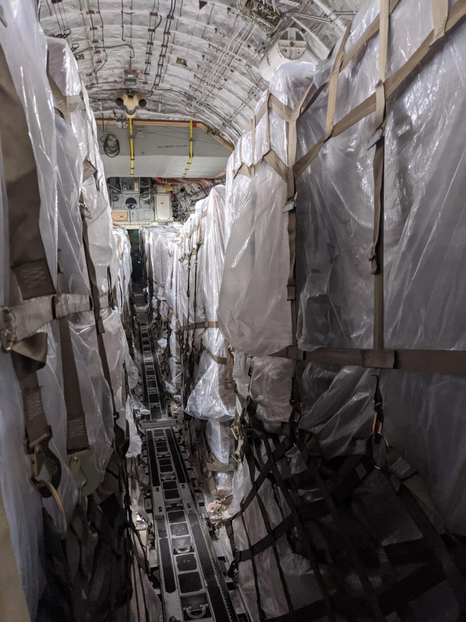 A photo of pallets on an aircraft.