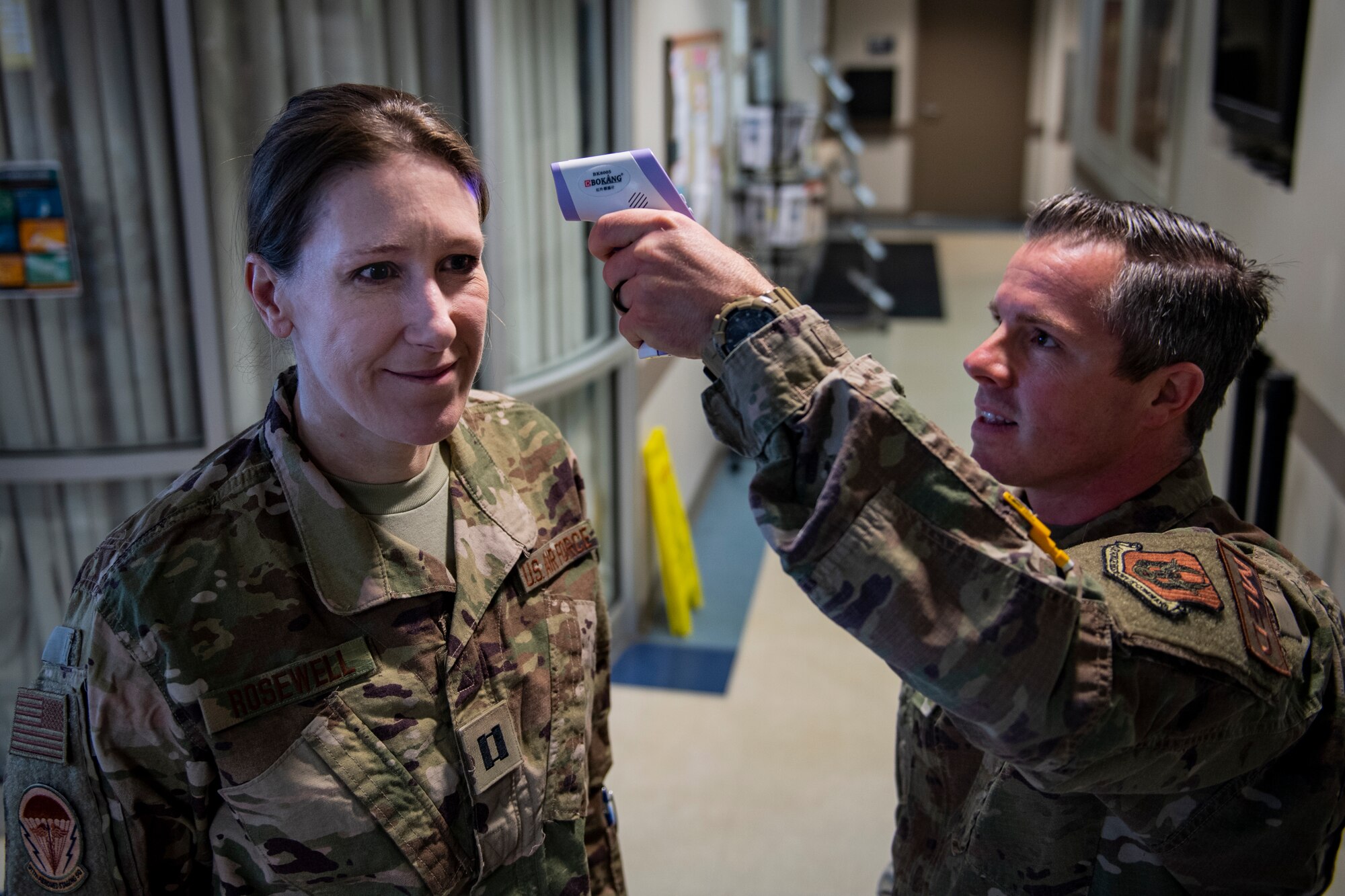 Capt. Kristine Rosewell, 911th Aeromedical Staging Squadron nurse, has her temperature checked before mobilizing at the Pittsburgh International Airport Air Reserve Station, Pennsylvania, April 5, 2020.