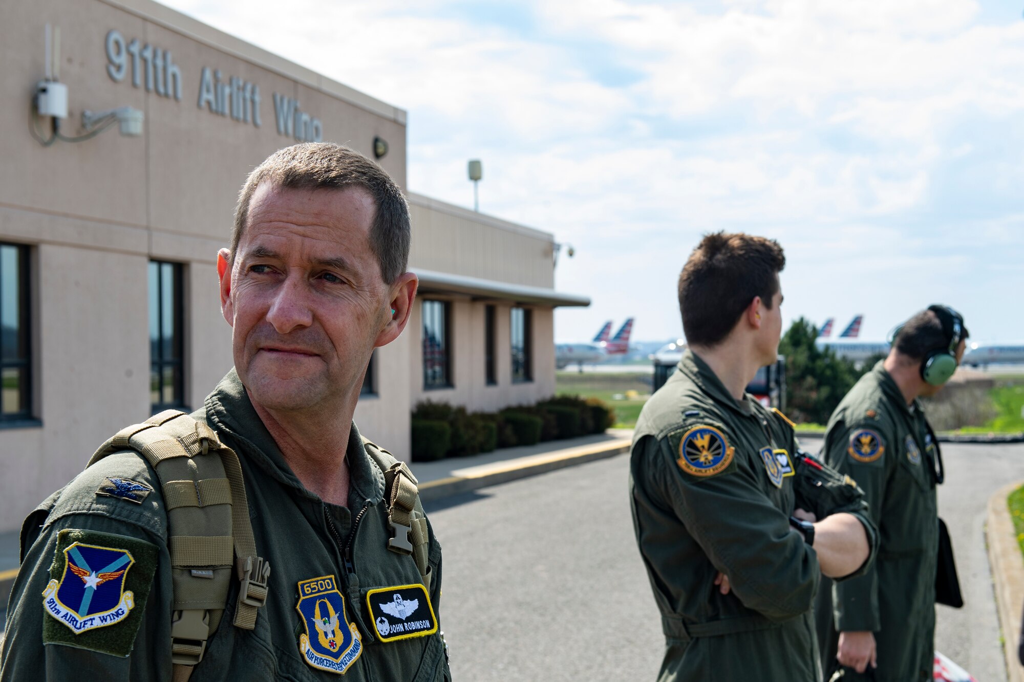 Col. John F. Robinson, 911th Airlift Wing commander, and other aircrew members prepare to transport mobilized Airmen to Joint Base Mcguire-Dix-Lakehurst, New Jersey in support of the COVID-19 efforts from the Pittsburgh International Airport Air Reserve Station, Pennsylvania, April 5, 2020.