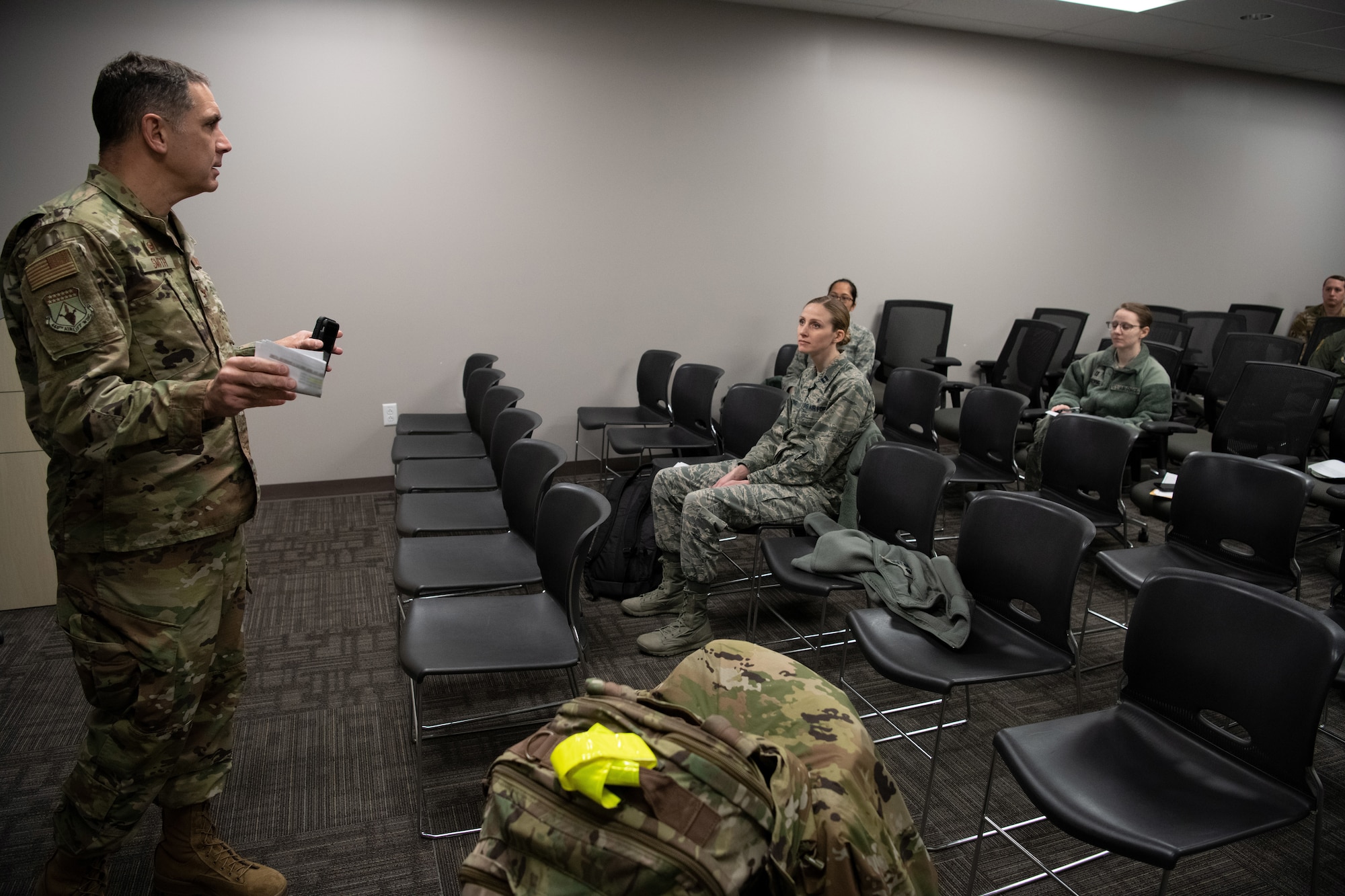 Col. Raymond A. Smith, Jr., 445th Airlift Wing commander, briefs deploying members from the 445th Airlift Wing’s Aerospace Medicine and Aeromedical Staging Squadrons, during out-processing here April 5, 2020.  Airmen from the 445th Airlift Wing were notified April 4, 2020 that they would be mobilized to New York City to help with the COVID-19 pandemic. The Citizen Airmen will join other military personnel providing medical services at the Jacob Javits Center in New York City. This deployment is part of a larger mobilization package of more than 120 doctors, nurses and respiratory technicians Air Force Reserve units across the nation provided over the past 48 hours in support of COVID-19 response to take care of Americans.  (U.S. Air Force photo/Mr. Patrick O’Reilly)