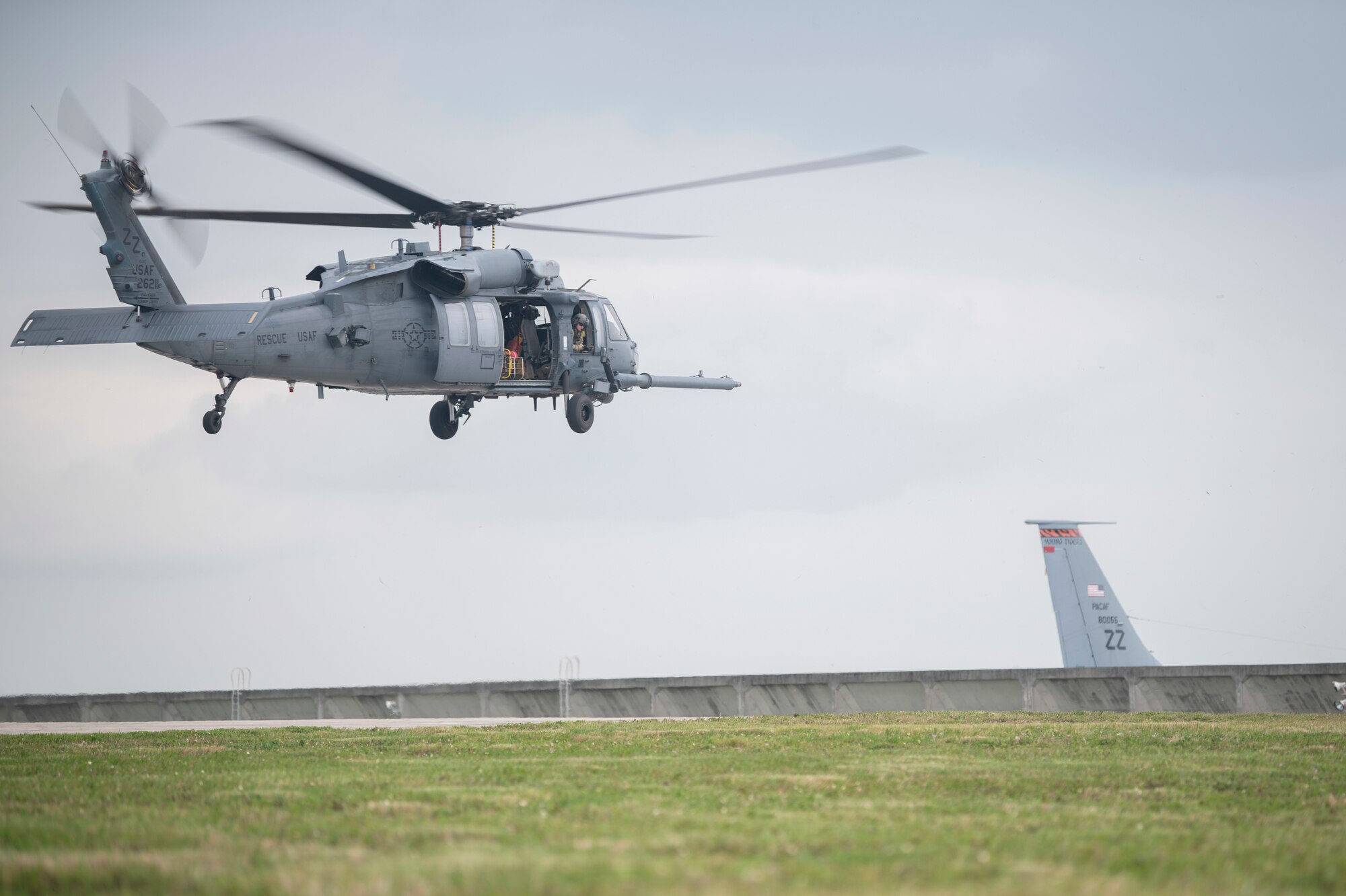 A U.S. Air Force HH-60 Pave Hawk, assigned to the 33rd Rescue Squadron, lifts off for a regular training mission April 3, 2020, at Kadena Air Base, Japan. Despite increased health protective measures, Kadena Airmen continue to maintain mission readiness in support of a free and open Indo-Pacific. The HH-60G Pave Hawk, or Precision Avionics Vectoring Equipment, has a hoist that can lift up to 600 pounds during personnel recovery operations. (U.S. Air Force photo by Senior Airman Rhett Isbell)