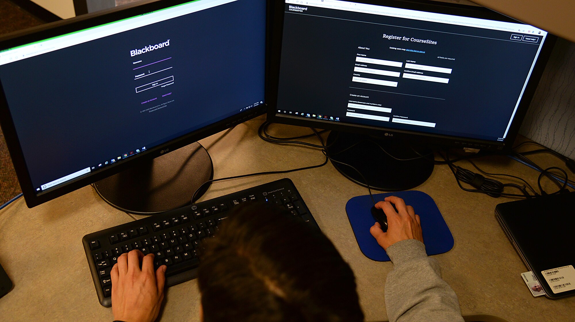 An image of a 177th Fighter Wing unit member utilizing a computer to accomplish training during a virtual Unit Training Assembly