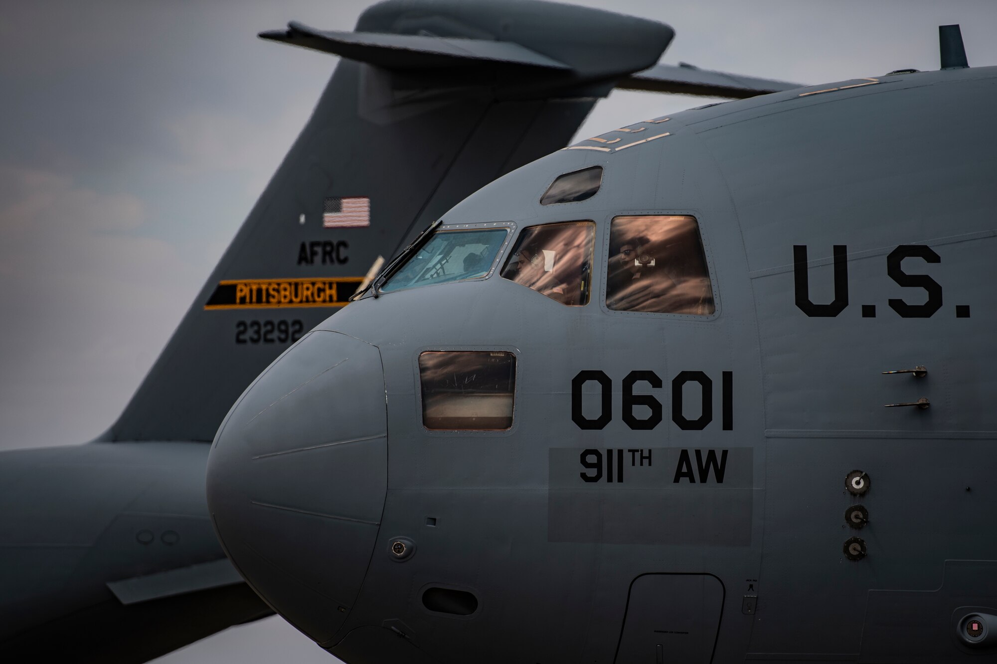 911th Airlift Wing aircrew members prepare to transport mobilized Airmen to Joint Base Mcguire-Dix-Lakehurst, New Jersey in support of the COVID-19 efforts from the Pittsburgh International Airport Air Reserve Station, Pennsylvania, April 5, 2020.