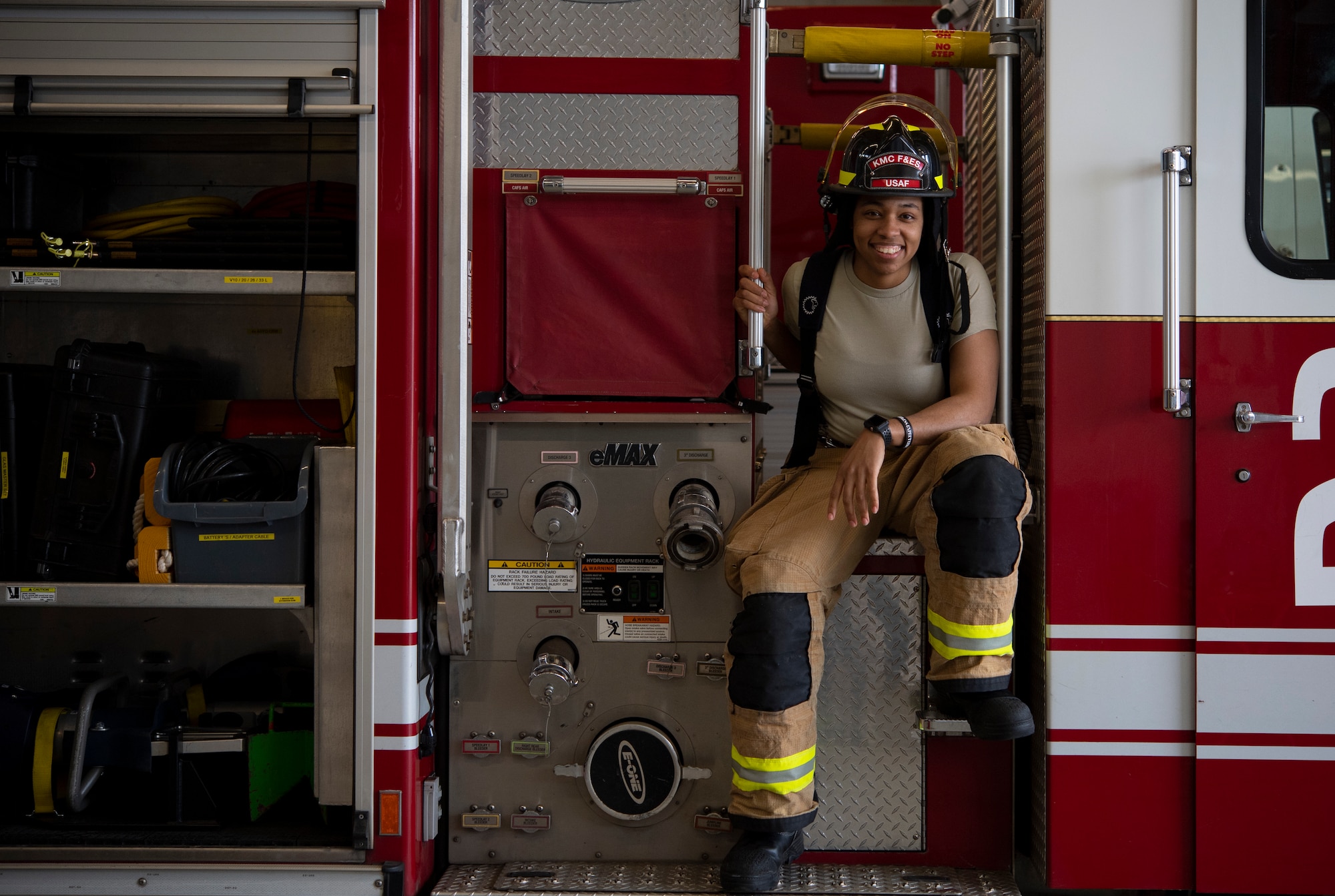 A photo of U.S. Air Force Airman 1st Class Kayla Jerido, 86th Civil Engineer Squadron fire protection apprentice, sitting on a fire truck at Vogelweh Military Complex, Germany, March 12, 2020.