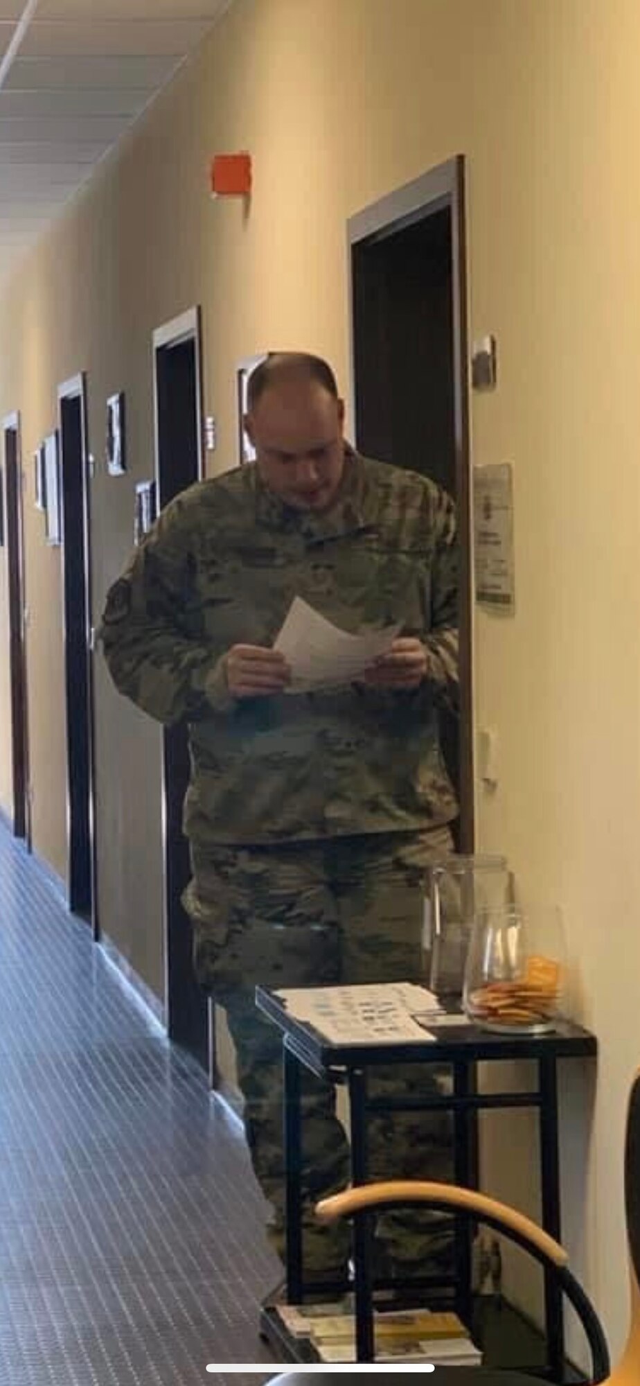 U.S. Air Force Technical Sgt. Addison Stemmer, 702nd Munitions Support Squadron NCOIC of the medical unit, reviews paperwork March 31, 2020, at Buechel Air Base, Germany. Stemmer was selected to start full-time preparatory course work for admission to medical school. (Courtesy photo by 702 MUNSS)