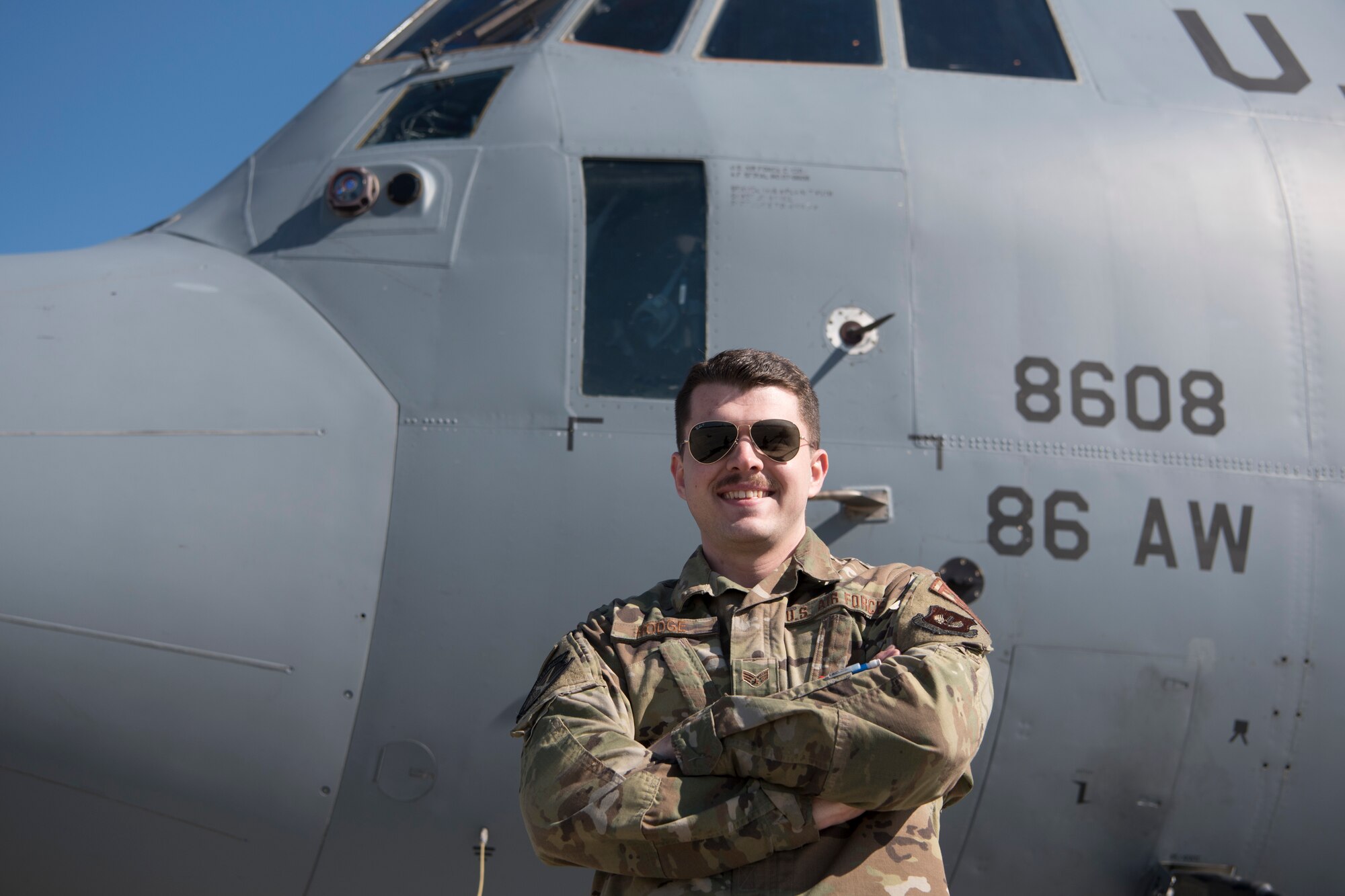 U.S. Air Force Senior Airman Kyle Hodge, 86th Aircraft Maintenance Squadron flying crew chief, wipes down hydraulic switches with a disinfectant solution on a C-130J Super Hercules aircraft, Ramstein Air Base, Germany, April 1, 2020. As concern over the coronavirus disease 2019 continued to emerge, the 86th AMXS implemented thorough disinfection procedures to ensure a minimum risk of exposure to the virus. (U.S. Air Force photo by Senior Airman Kristof J. Rixmann)