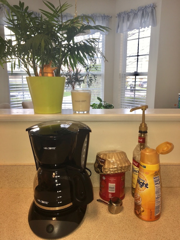 Melody Arnold, a DLA Troop Support Audit Readiness and Compliance business process analyst, set up a coffee station to remind her of habits she would do at the office April 3, 2020.