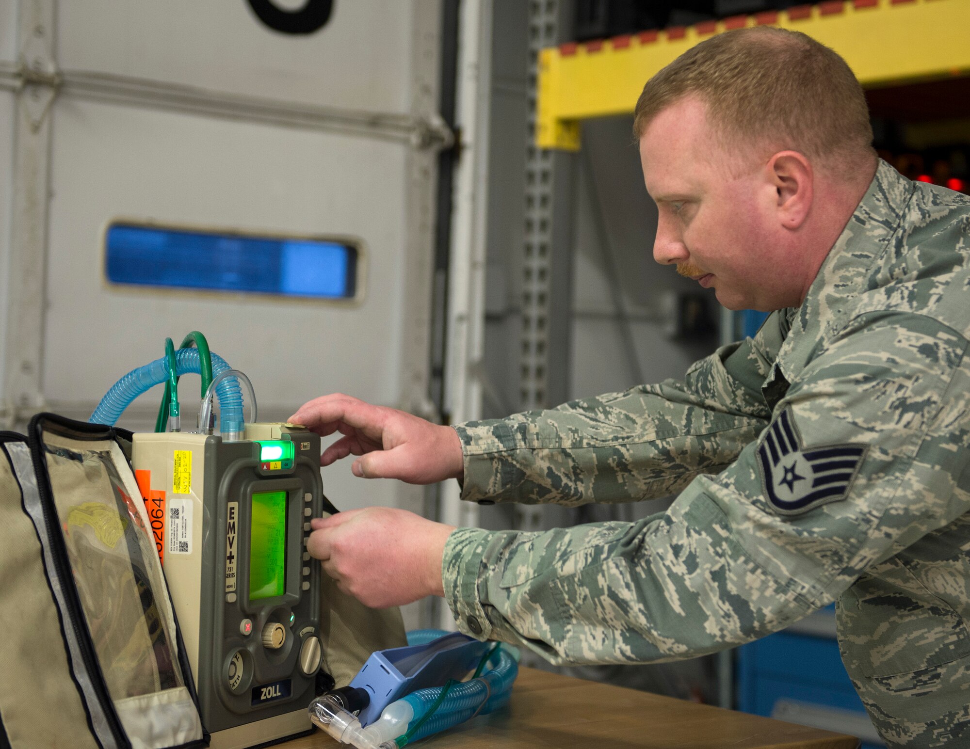 U.S. Air Force Staff Sgt. William Vievering, 133rd Chemical, Biological, Radiological and Nuclear Defense (CBRN) Enhanced Response Force Package, checks the Zoll 731 Ventilators after being calibrate in St. Paul, Minn., Mar., 19, 2020.