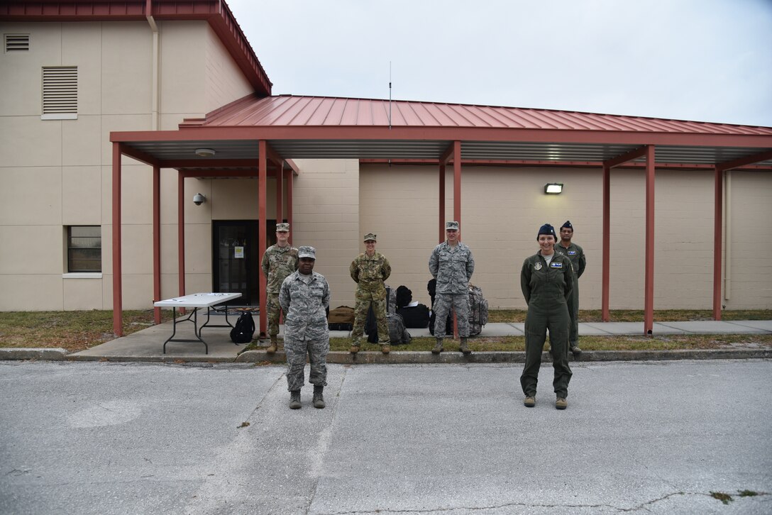 (Back row from left) 1st Lt. Joseph O’Brien, 927th Aeromedical Staging Squadron, nurse,  Col. Jennifer Ratcliff, 927th Aerospace Medicine Squadron Commander, Lt. Col Christopher Dremann, 927th Aerospace Medicine Squadron, nurse, Lt. Col. Raja Talati, 927th Aerospace Medicine Squadron, flight doctor, (front row from left) Capt. Sarilia Therildor, 927th Aeromedical Staging Squadron, nurse,  and Maj. Jannlee Glaiser, 927th Aerospace Medicine Squadron, flight doctor prepare to head to New York City to care for fellow Americans. 

With less than  24 hours’ notice, doctors and nurses assigned to the 927th Air Refueling Wing boarded a C-130 at MacDill AFB, Fla., April 5, headed for Joint Base McGuire-Lakehurst, N.J. where they will be a part of more than 100 medical professionals sent from Air Force Reserve Command to work with state and local authorities in the region as they combat COVID-19. (U.S. Air Force photo by Tech. Sgt. Peter Dean)
