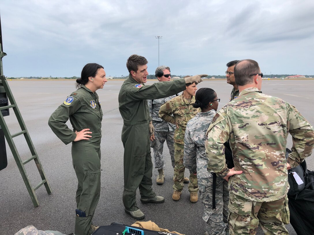 Master Sgt. Andrew Alexandersen, loadmaster, 94th Airlift Wing, Dobbins Air Reserve Base, Ga., briefs COVID-19 responders with C-130 loading instructions.  With less than  24 hours’ notice, doctors and nurses assigned to the 927th Air Refueling Wing, boarded a C-130 at MacDill AFB, Fla., April 5, headed for Joint Base McGuire-Lakehurst, N.J. where they will be a part of more than 100 medical professionals sent from Air Force Reserve Command to work with state and local authorities in the region as they combat COVID-19. (U.S. Air Force photo by Tech. Sgt. Peter Dean)