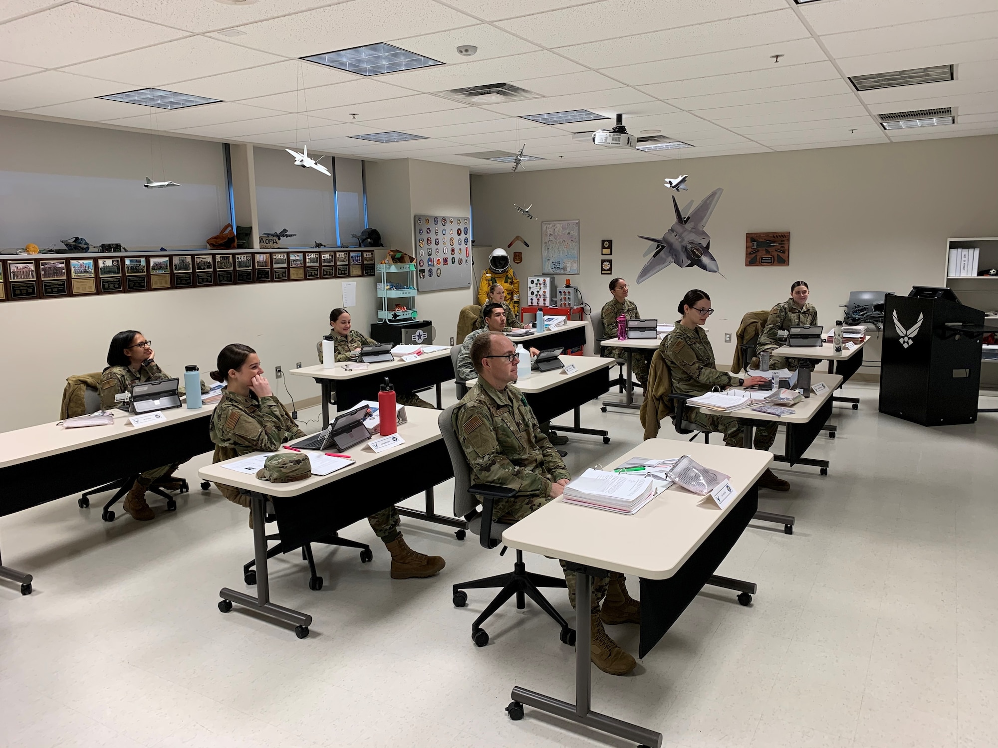 Students receiving training during the Aerospace Physiology Apprentice Course at the United States Air Force School of Aerospace Medicine maintain appropriate social distancing requirements April 1. The Centers for Disease Control and Prevention recommend people ensure they maintain at least six feet distance between themselves and others to avoid getting sick by sharing the COVID-19 virus. This course awards the 4M AFSC to assist in managing altitude chambers, emergency procedures, and high-altitude operations. Students follow-on to flight medicine shops across the Air Force to assist aviators in remaining current and cleared for flying status. (U.S. Air Force photo/Capt. Matthew Smith)