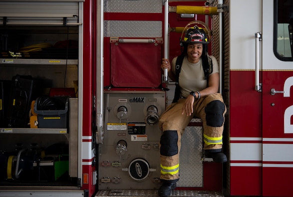 A photo of U.S. Air Force Airman 1st Class Kayla Jerido, 86th Civil Engineer Squadron fire protection apprentice, sitting on a fire truck at Vogelweh Military Complex, Germany, March 12, 2020.