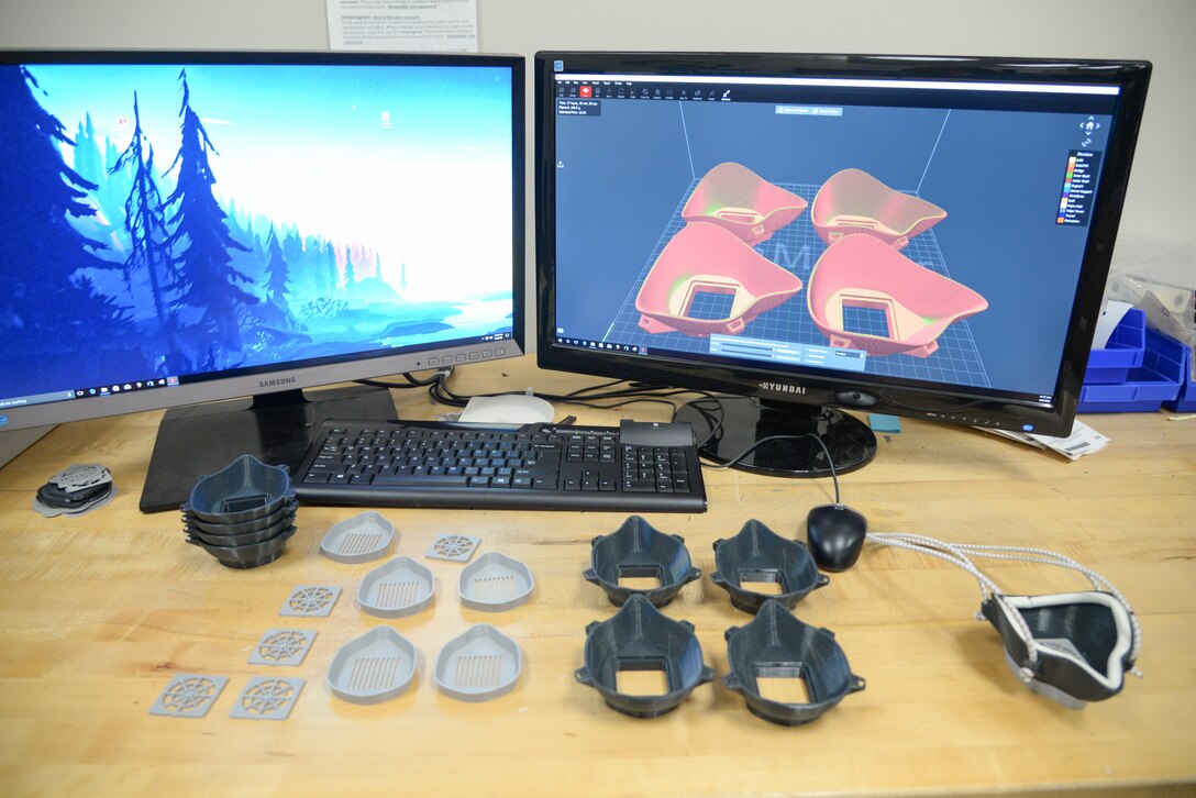 A photo of a 3D printer manufacturing N-95 face masks.