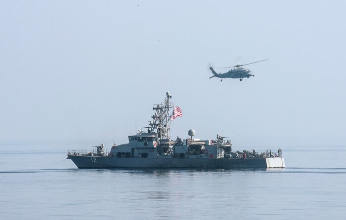 he Cyclone-class coastal patrol ship USS Thunderbolt (PC 12) participates in high-value asset escort training during Exercise Spartan Kopis.